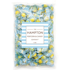 Lemonheads candy close-up highlights tart yellow sugar coating and crisp texture.