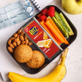 Pantry shelf displays Handi-Snacks RITZ snack packs, easy pantry-friendly snacking.