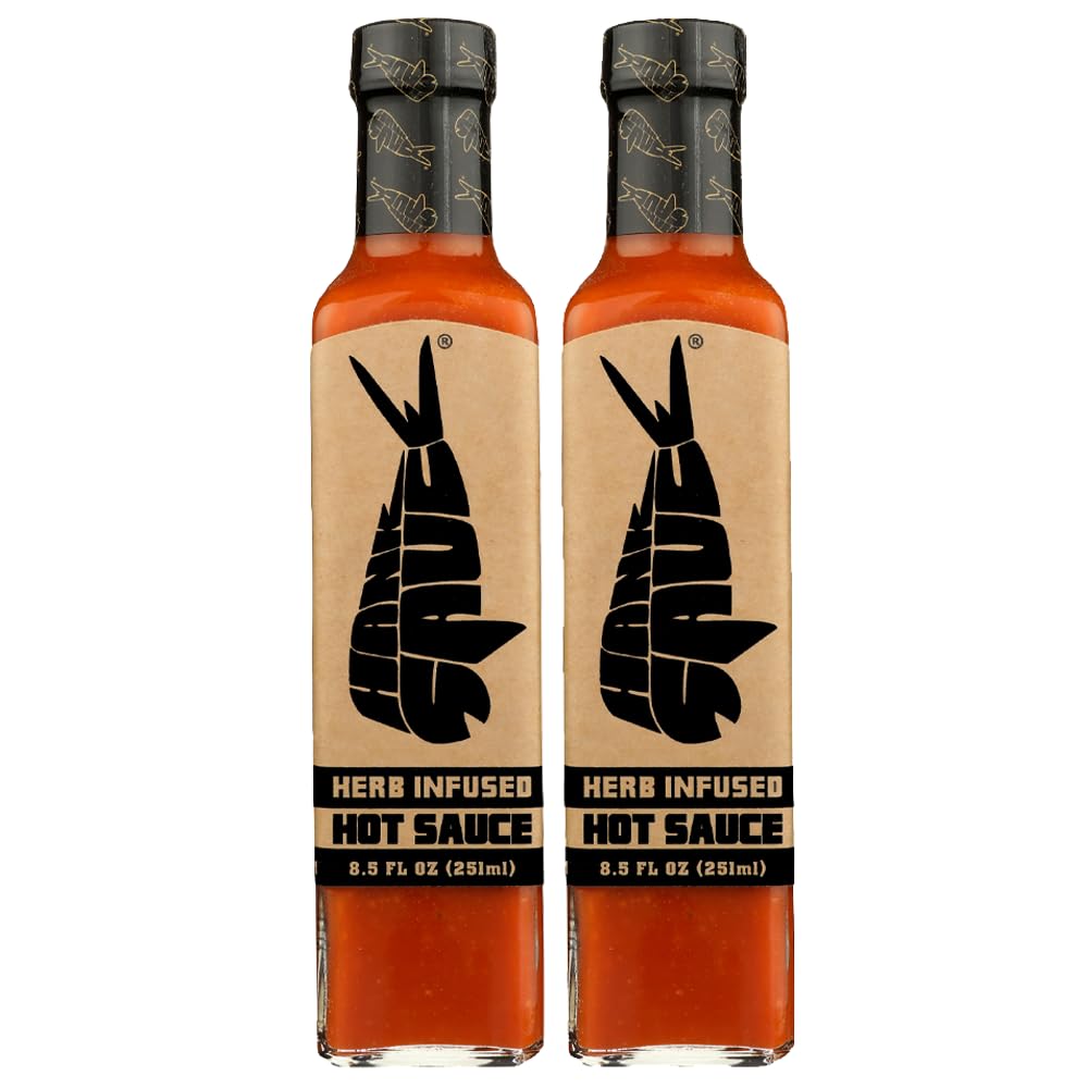 Hank Sauce herb-infused hot sauce bottle pour for balanced flavor on eggs and pizza