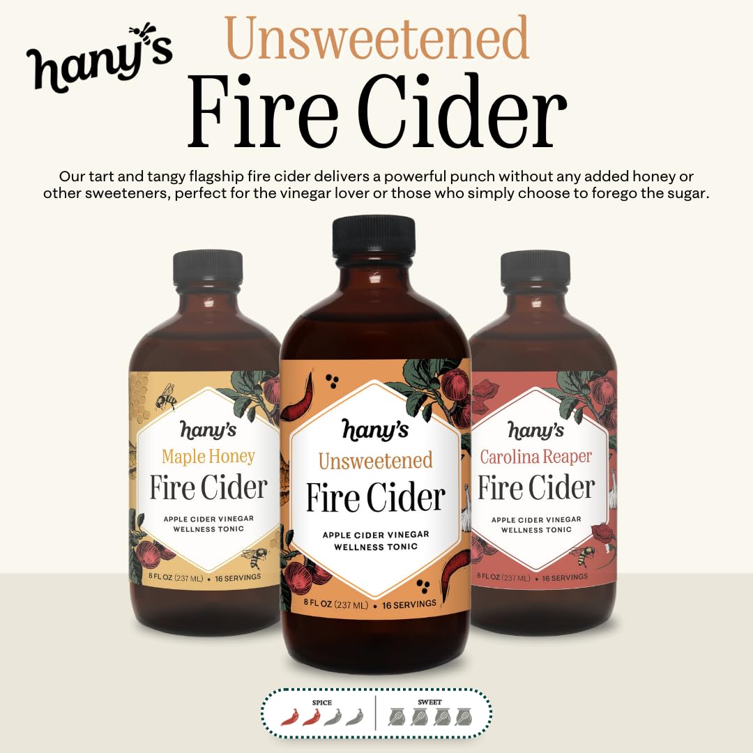 Hany's Harvest Fire Cider pour into tea image, suggesting a bold herbal kick.