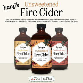 Hany's Harvest Fire Cider pour into tea image, suggesting a bold herbal kick.