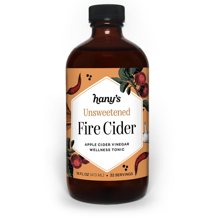 Hany's Harvest Unsweetened Fire Cider 16oz bottle, front view, ideal for adding zesty flavor to meals.