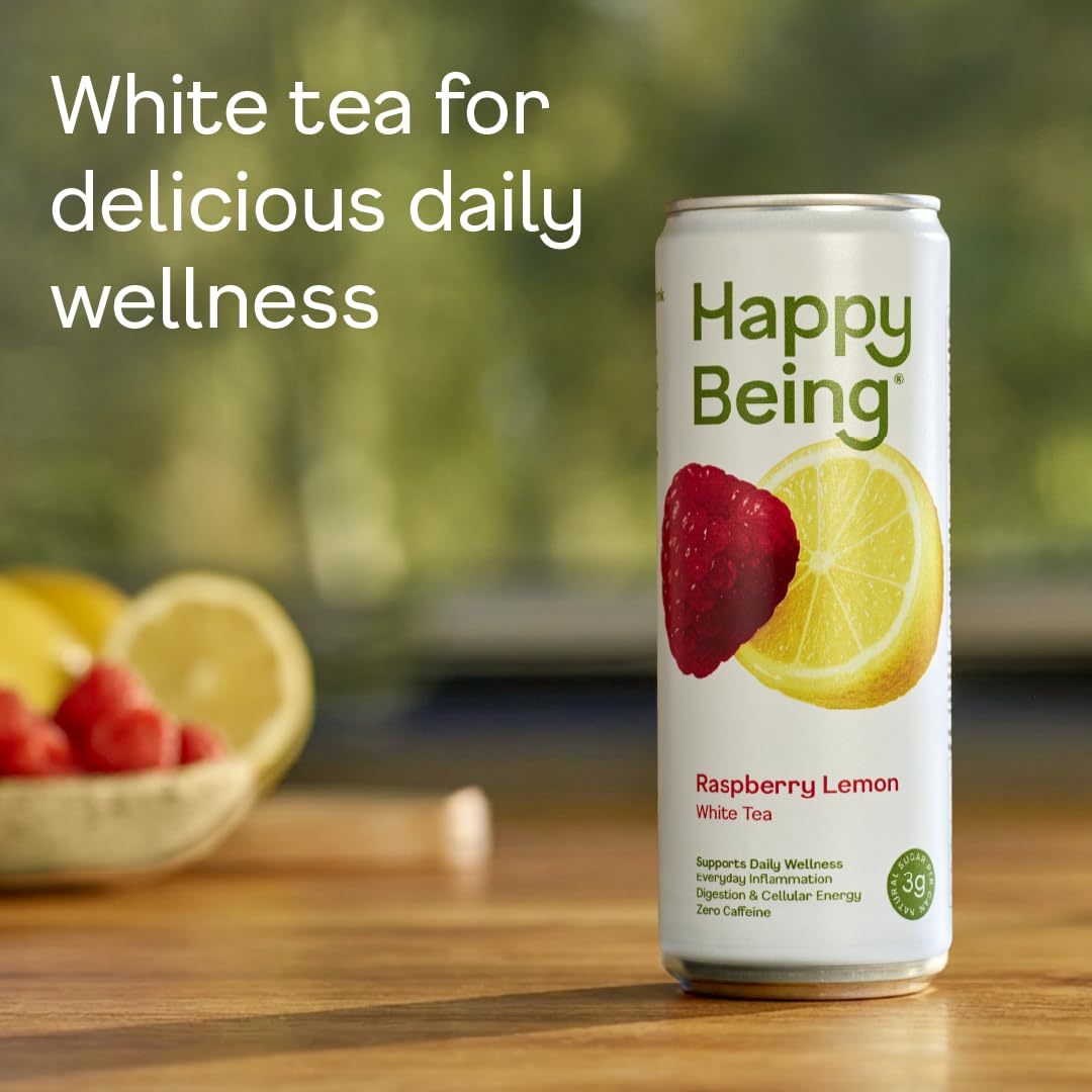 Pouring Happy Being Raspberry Lemon White Tea into a glass for everyday refreshment
