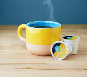 Happy Belly breakfast blend pods arranged for quick grab-and-go mornings.