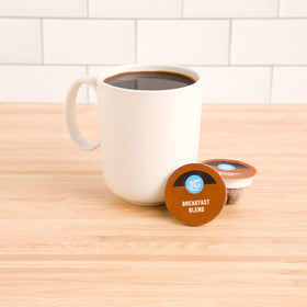 Happy Belly Breakfast Blend pods light roast delivers smooth morning cup.