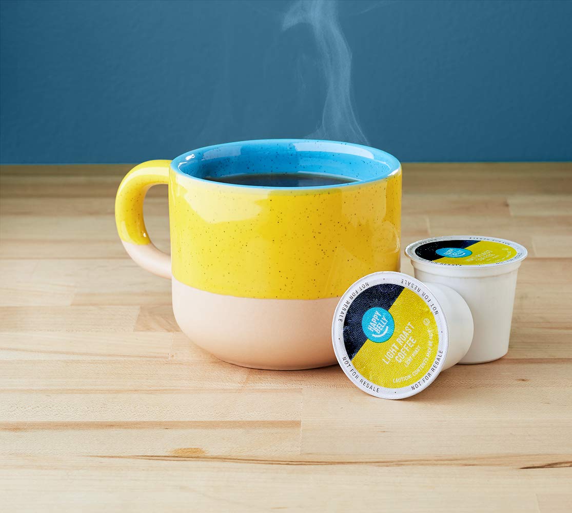 Close-up of Happy Belly light roast pods with Arabica beans for a smooth morning brew.