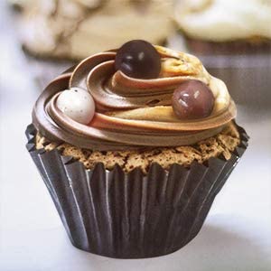 Happy Bites vanilla coating close-up, revealing a smooth aroma and delicate finish.