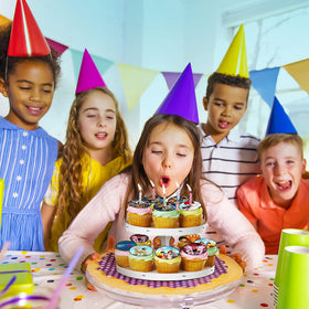 Happy Choices sword and map topper on wafer elevates party presentation.