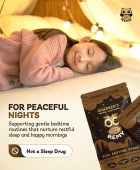 Happy Owl Remy bottle on nightstand, supporting a calm nighttime routine.