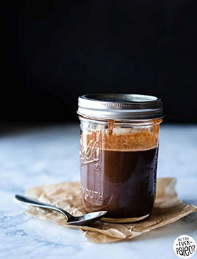 Har Bracha Tahini Paste jar closeup highlights creamy texture perfect for drizzle.