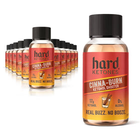 Hard Ketones Straight-Up Cinna-Burn bottle on a bar, convenient alcohol alternative.