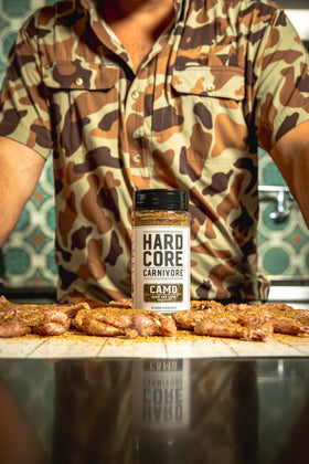 Hardcore Carnivore Camo in a smoker for intense, smoky flavor.