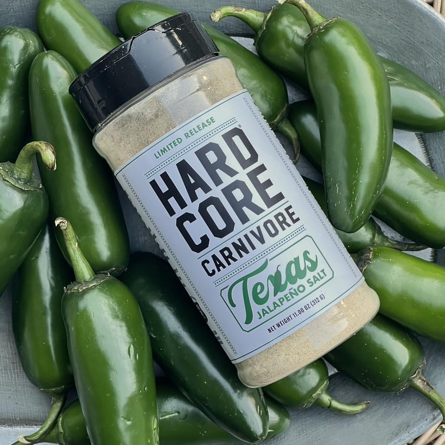 Hardcore Carnivore Texas Jalapeno Salt shaker pouring spice for DIY rubs and seasoning.