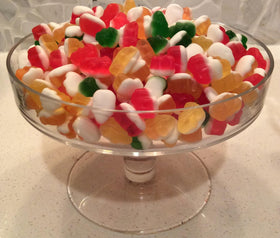 Close-up of Haribo Rainbow Frogs with chewy fruit flavors for on-the-go snacking.