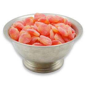 Haribo Peaches Gummi Candy closeup highlighting sugar-dusted gummies