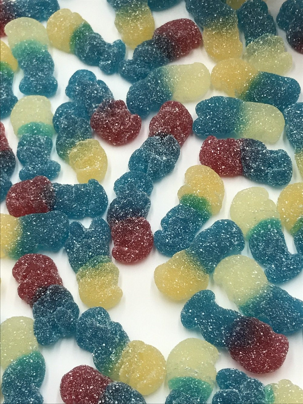 HARIBO Sour Smurfs candy closeup texture, showing chewy color and tang.