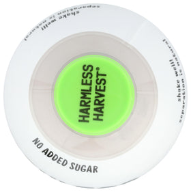 Harmless Harvest label close-up, clean ingredients and no added sugar emphasized.