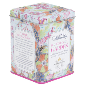 Harney & Sons Pomegranate Garden tea sachet closeup highlighting hibiscus and oolong flavors.