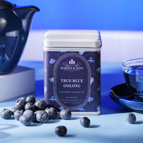 Harney and Sons True Blue Oolong cup poured, displaying blue hue and fruity notes.