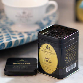 Harney & Sons Black Currant tea brew in cup demonstrates a fragrant fruity infusion.