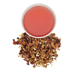 Harney & Sons Blood Orange Fruit Tea cup brew showing a bright orange infusion and caffeine-free aroma.