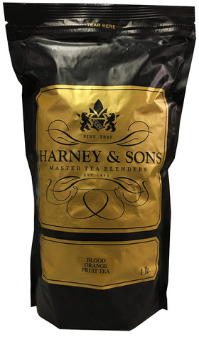Harney & Sons Blood Orange tea loose-leaf in a basket, caffeine-free and ready to brew.