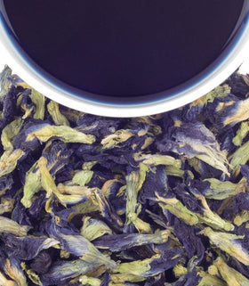 Harney & Sons Butterfly Pea Flower Tea brewed in a cup for a mild earthy infusion.