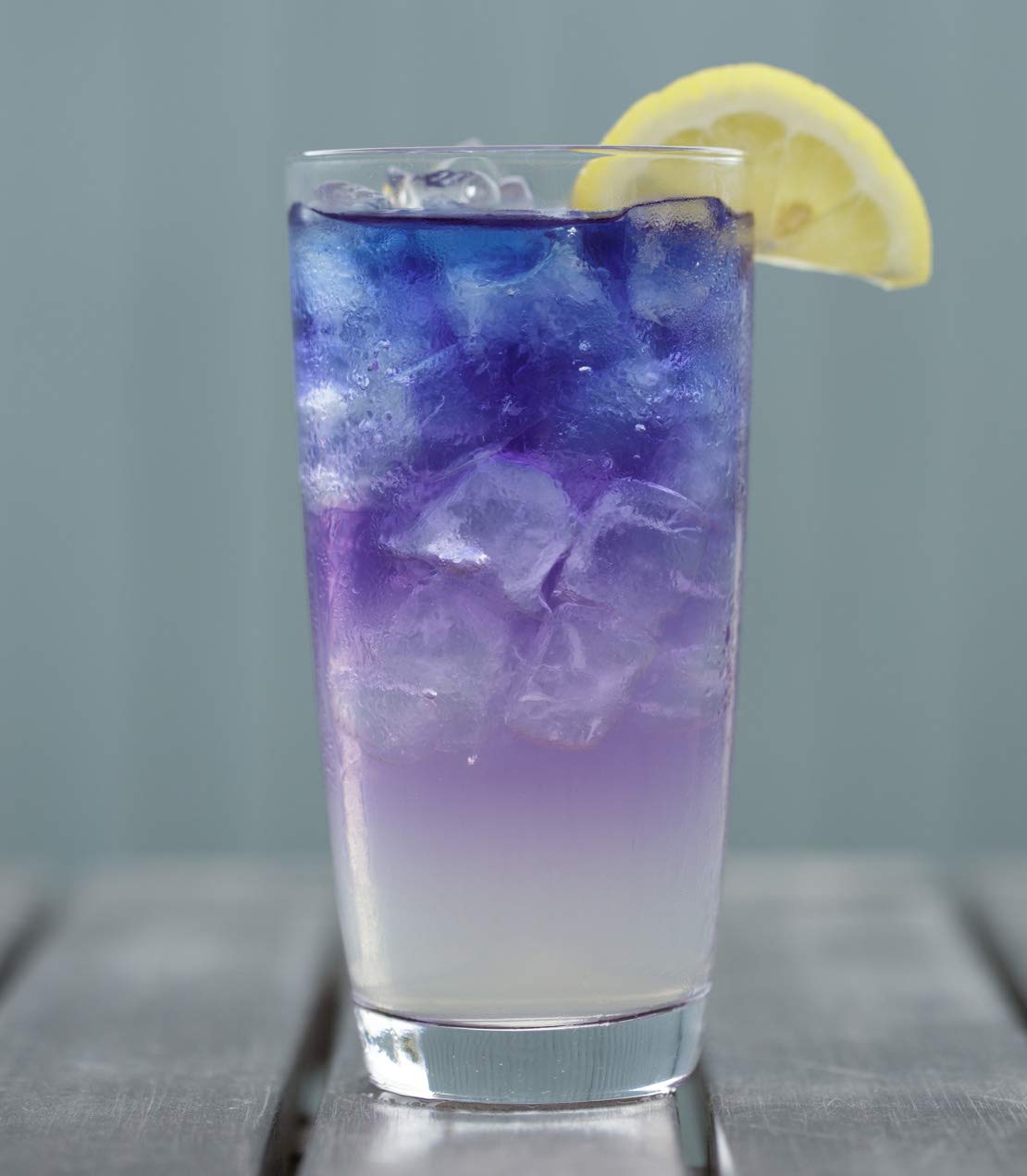 Harney & Sons Butterfly Pea Flower Tea color-changing when lemon is added.