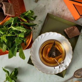 A brewed cup of Harney & Sons Chocolate Mint reveals chocolate notes with peppermint aroma.