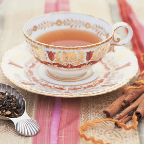 Cup of Harney & Sons Hot Cinnamon Spice steeping with bold, aromatic flavor.