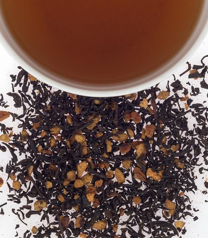 Steaming cup of Harney & Sons Hot Cinnamon Spice tea with orange and clove notes.