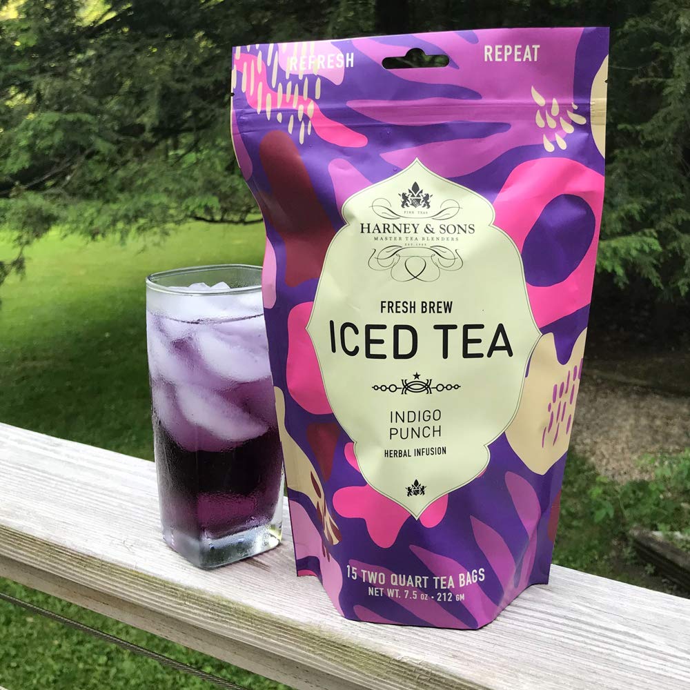 Harney & Sons Indigo Punch blue tea in pitcher ready to serve with lemon