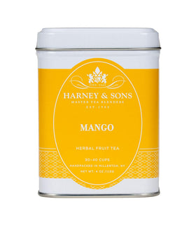 Harney & Sons Mango Fruit Tea tin showing the ruby-red brew and product packaging.