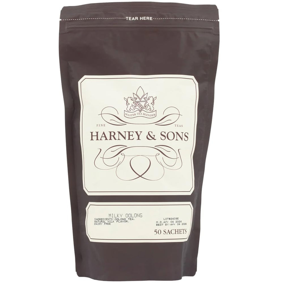 Harney & Sons Milky Oolong tea bag beside a cup with creamy aroma.