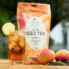 Harney and Sons Organic Peach Fresh Brew Iced Tea served in glass with inviting summer refreshment.