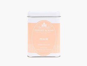 Harney & Sons Peach Fruit Tea close-up, showcasing peach pieces for natural flavor and aroma.