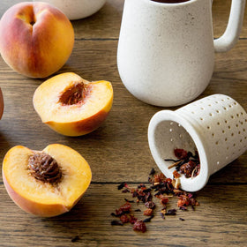 Harney & Sons Peach Fruit Tea iced serve, refreshing, caffeine-free, perfect for hot afternoons.