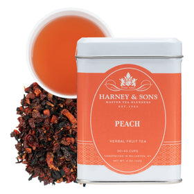 Harney & Sons Peach Fruit Tea loose leaf, vibrant ruby infusion, caffeine-free for anytime sipping.