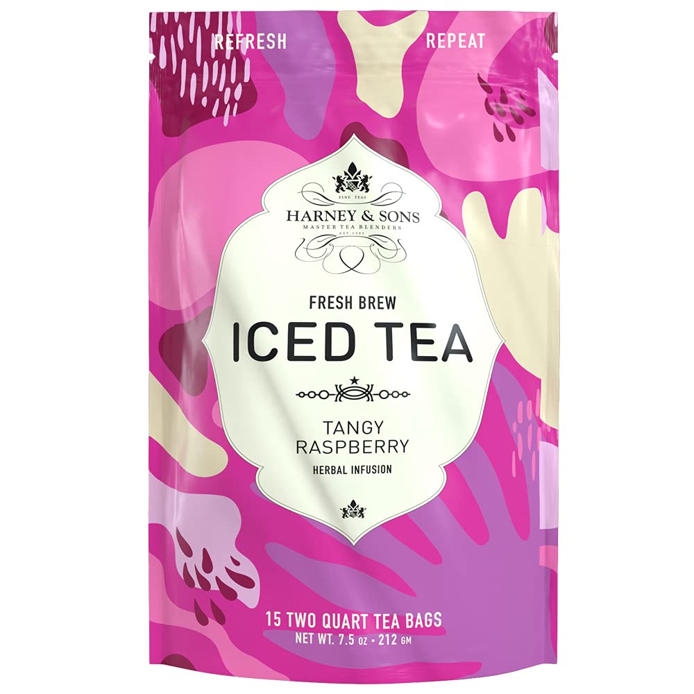 Pouring Harney & Sons Tangy Raspberry Iced Tea into a glass shows vibrant color.