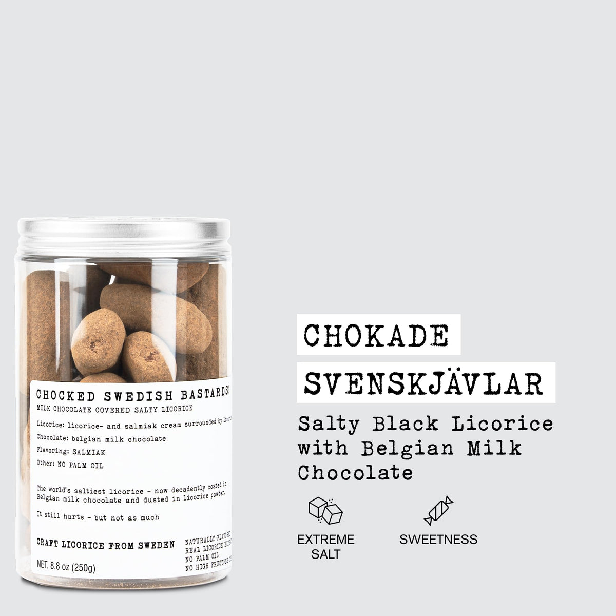 Close-up bite of Chokade Svenskvlar showing intense salmiak salt and chocolate layer.