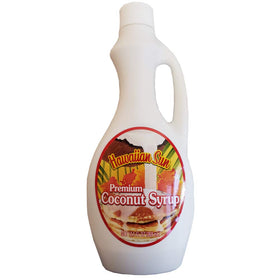 Hawaiian Sun Premium Coconut Syrup bottle pouring on pancakes for tropical flavor