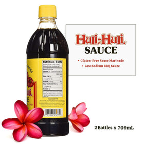Hawaii's Famous Huli-Huli Sauce marinating chicken for flavorful, tropical-inspired meals.