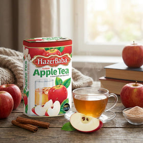 Glass of HazerBaba red apple drink ready to enjoy.