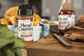 Head Country BBQ setup on grill shows rich aroma and color.