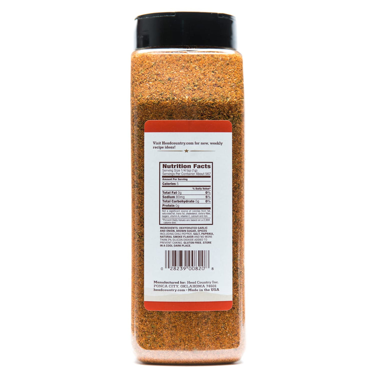 Head Country Championship Seasoning sprinkled on ribs for competition-grade taste.