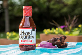 Head Country Hot & Spicy BBQ Sauce bottle glaze on ribs for competition-level flavor.