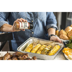 Head Country seasoning bowl with rub for vegetables and brisket prep.