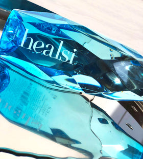 Healsi artesian water 12-pack turquoise bottles, convenient for family sharing and stocking up.