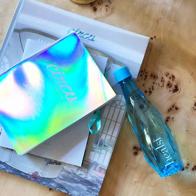 Healsi artesian water pouring into a glass, crisp taste for meals or workouts.