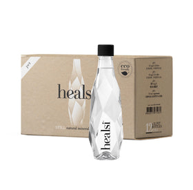 Pouring Healsi water to show balanced pH7 for smooth hydration.